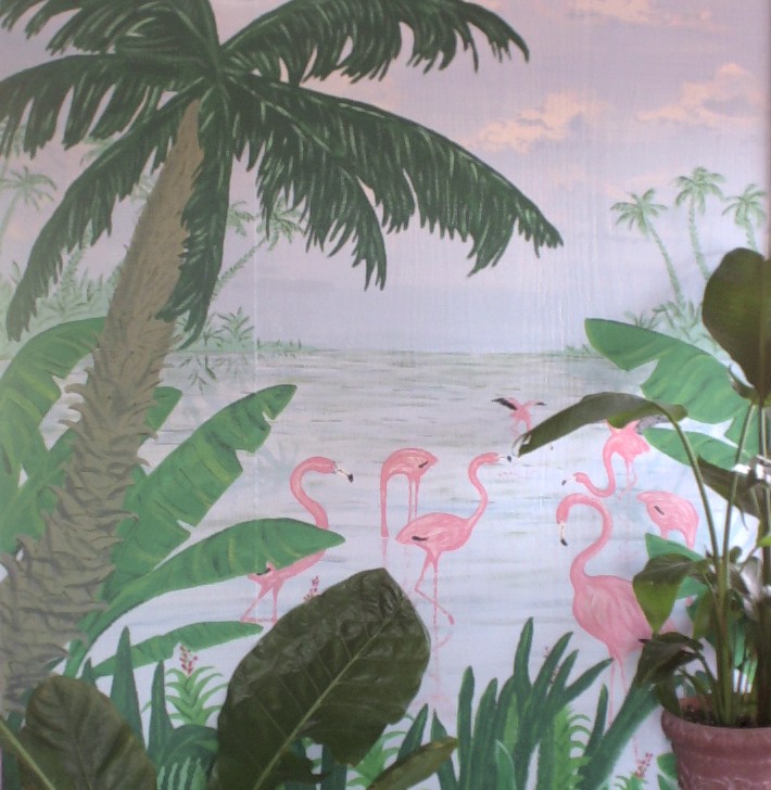 Shelton Meacham, local Shreveport artist, painted this scene depicting a flock of pink flamingos in the entryway of Tacomania in Shreveport, LA.